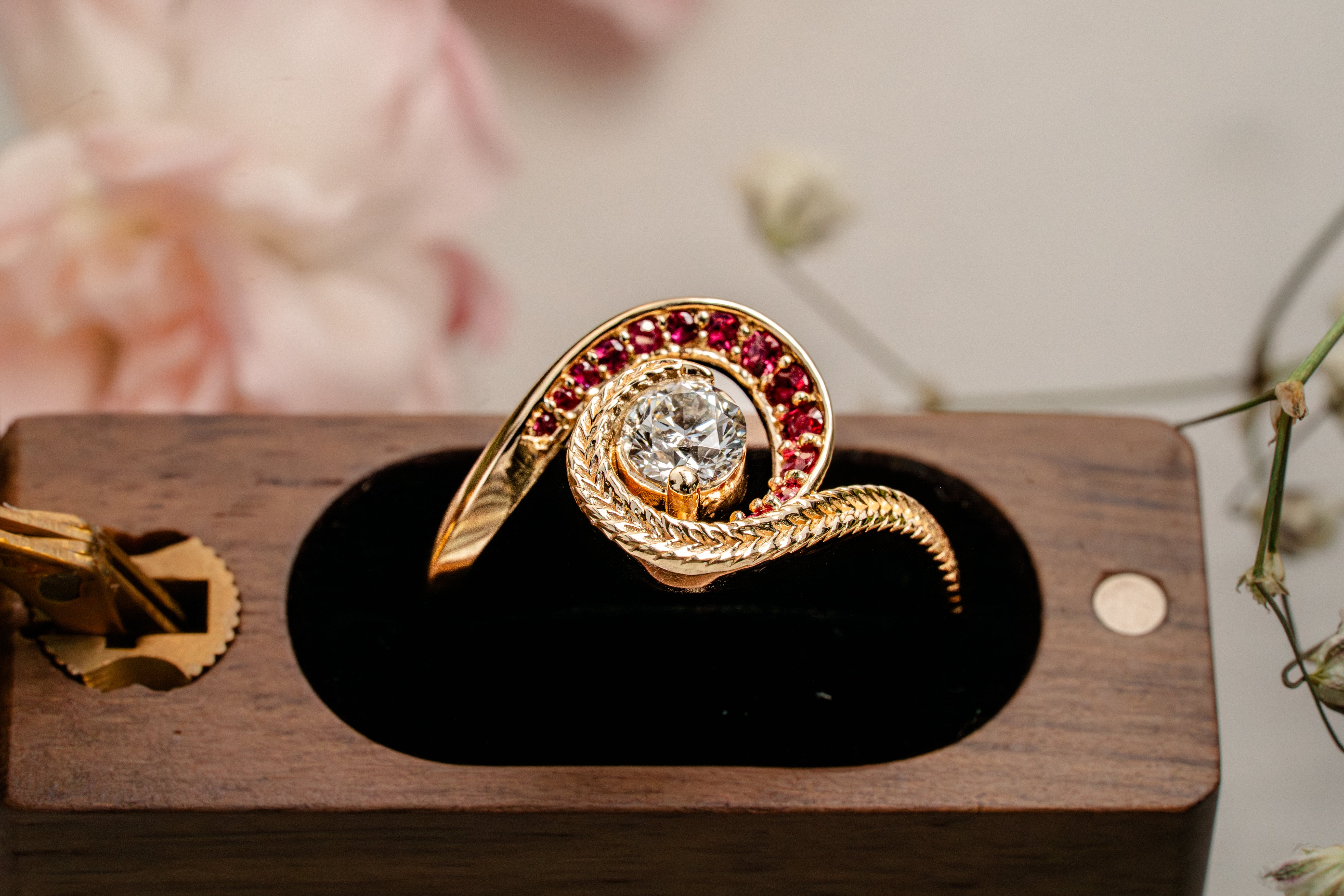 Custom Swirling Diamond Ruby Wave Ring with Maile Vine