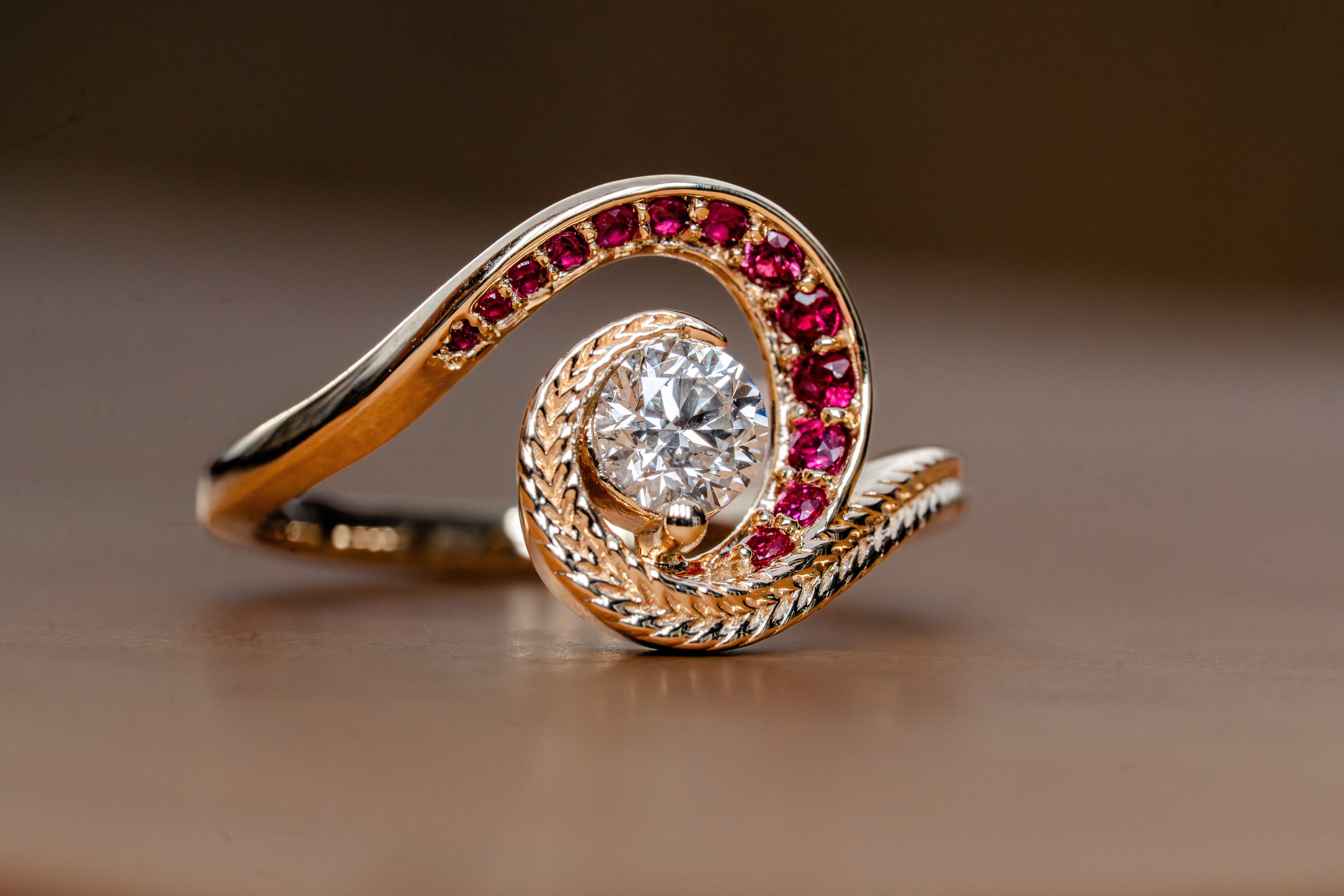 Custom Swirling Diamond Ruby Wave Ring with Maile Vine