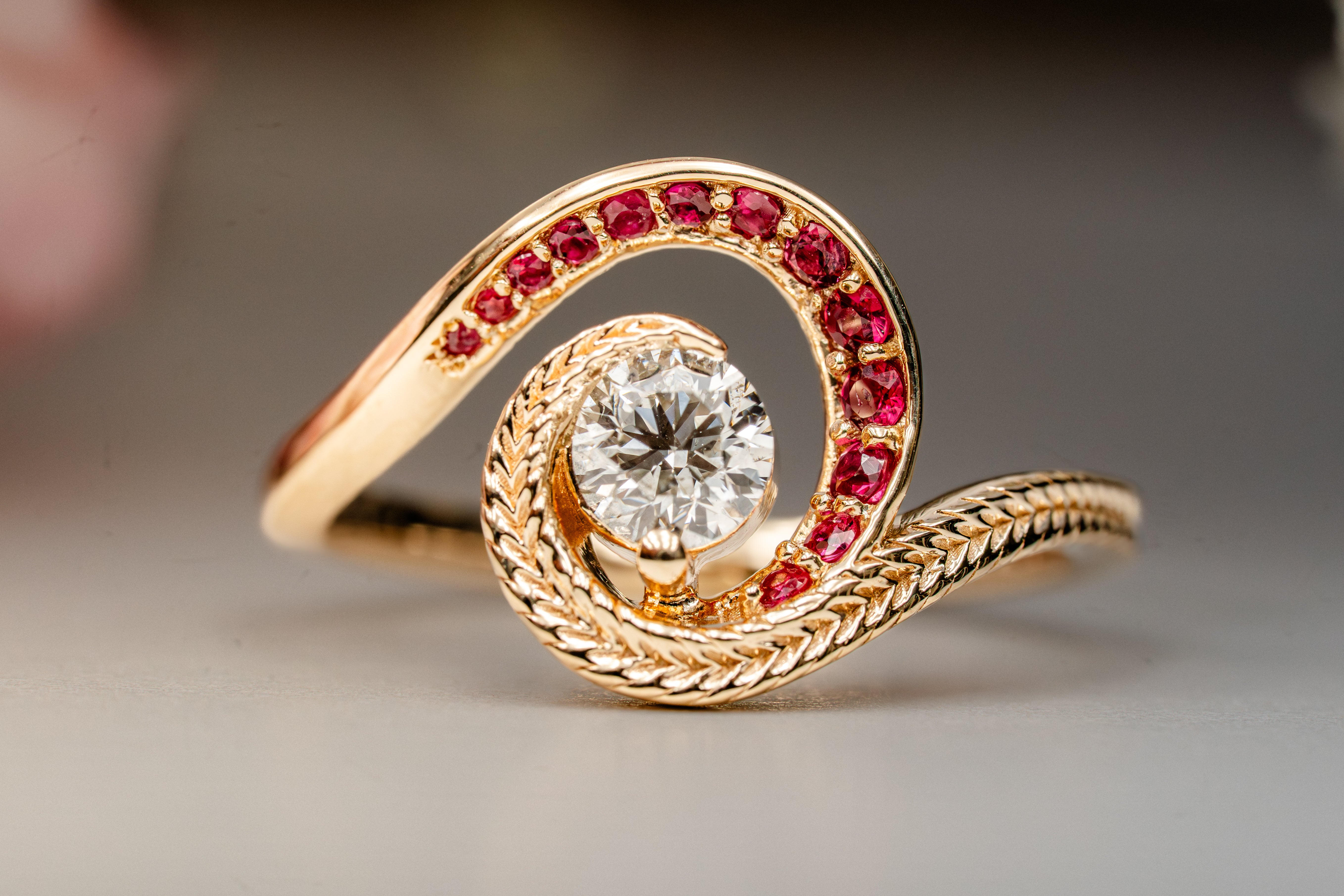 Custom Swirling Diamond Ruby Wave Ring with Maile Vine