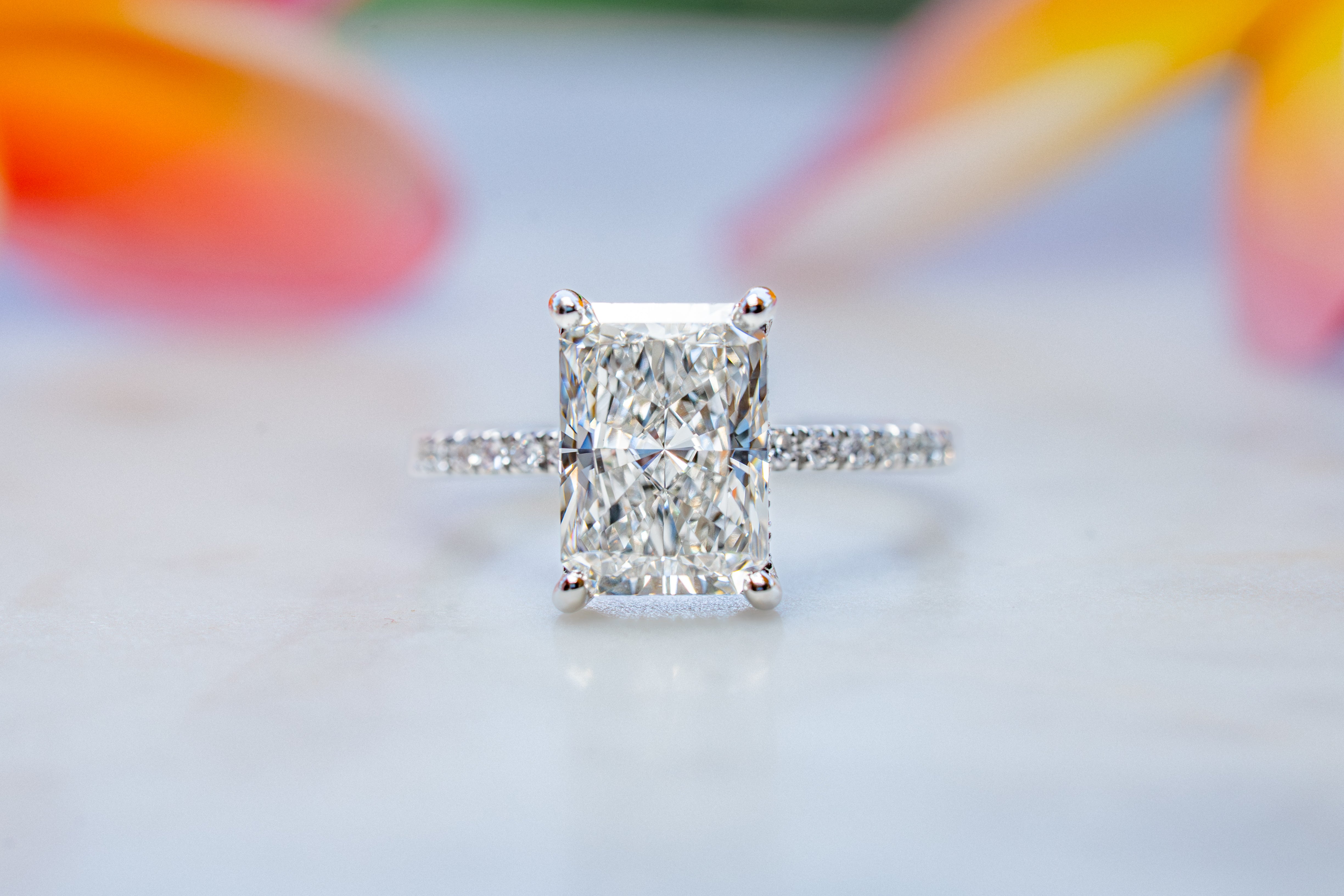 Custom 4ct Radiant Diamond Platinum Ring with Hidden Halo