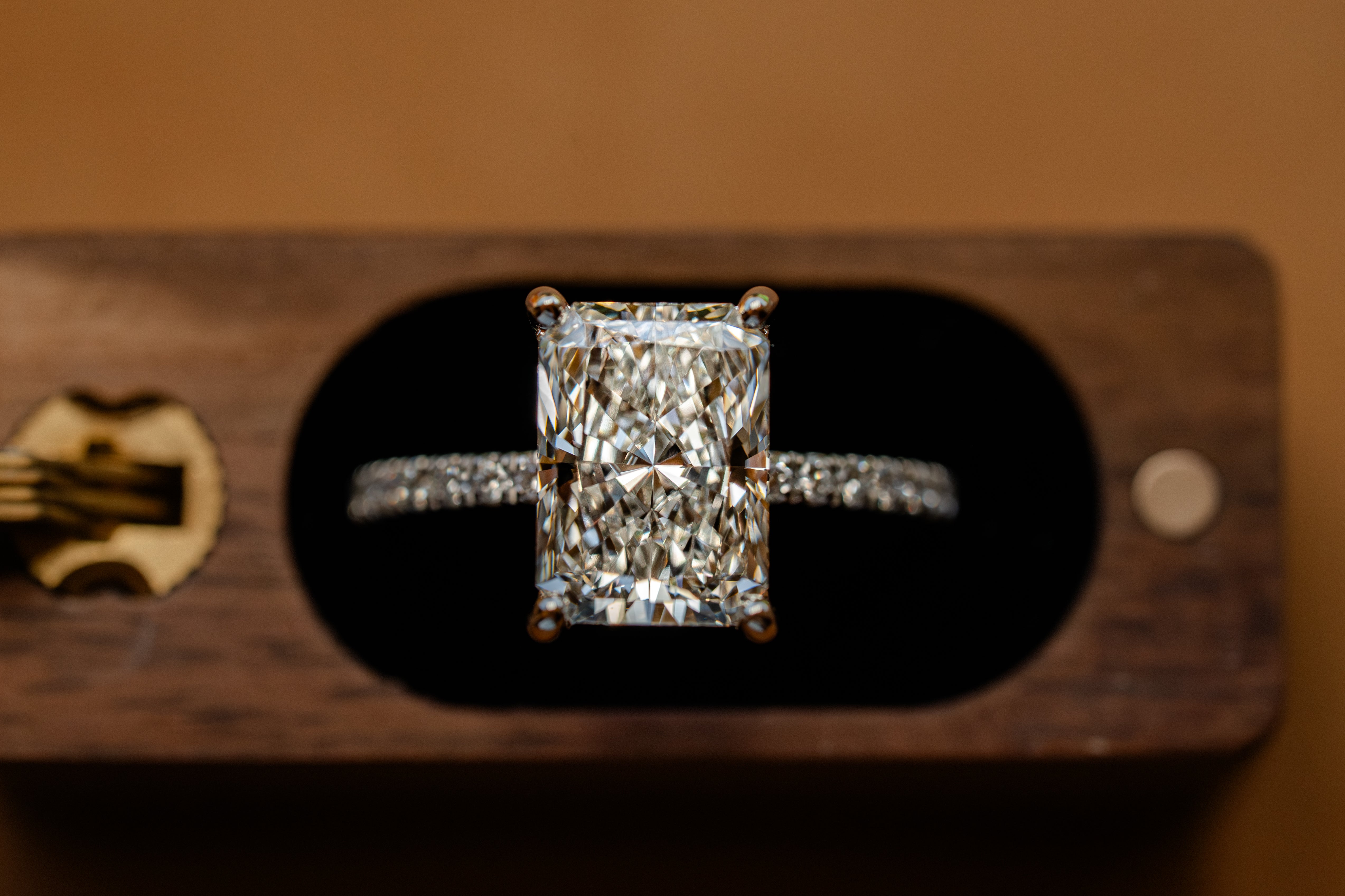 Custom 4ct Radiant Diamond Platinum Ring with Hidden Halo