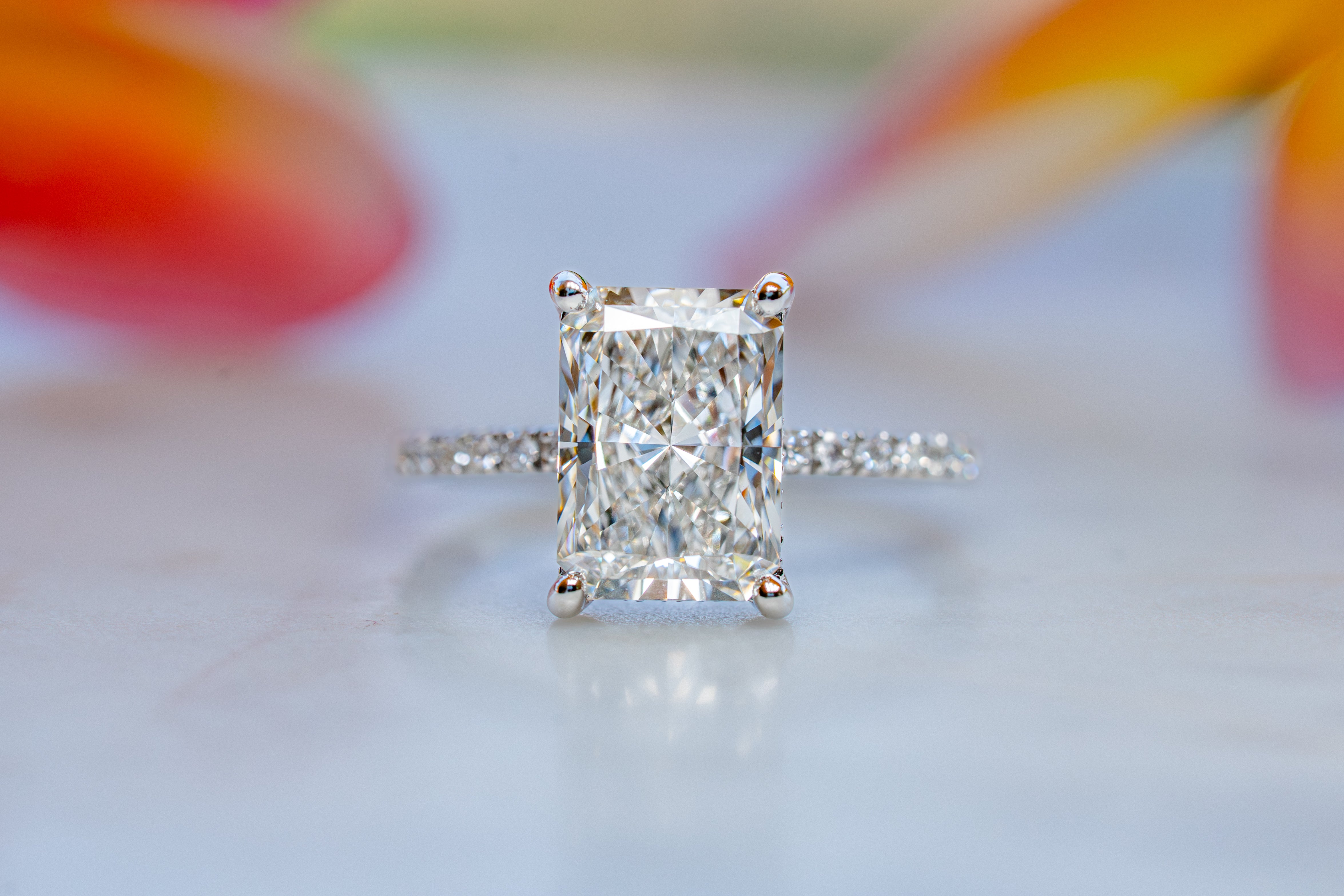 Custom 4ct Radiant Diamond Platinum Ring with Hidden Halo