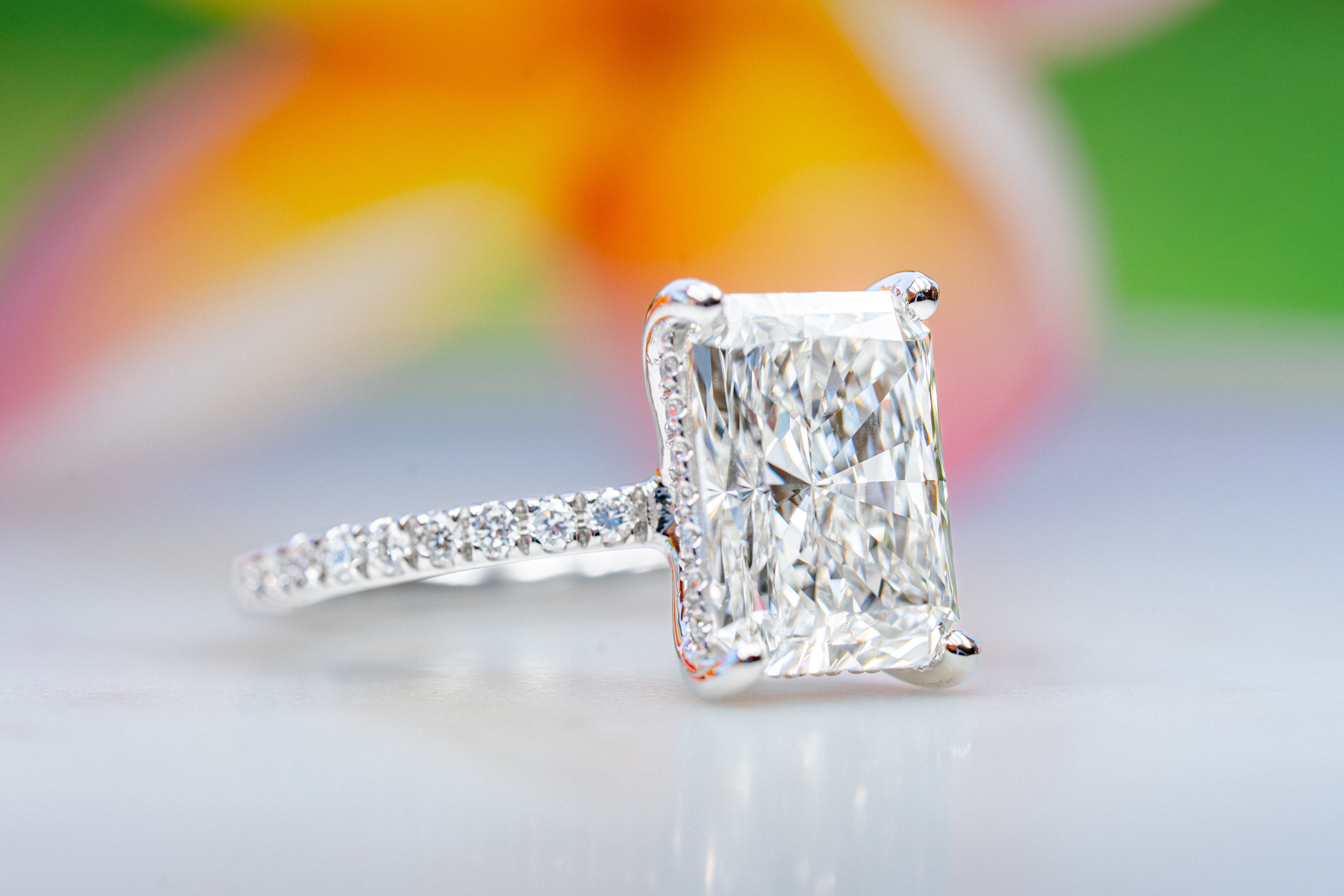 Custom 4ct Radiant Diamond Platinum Ring with Hidden Halo