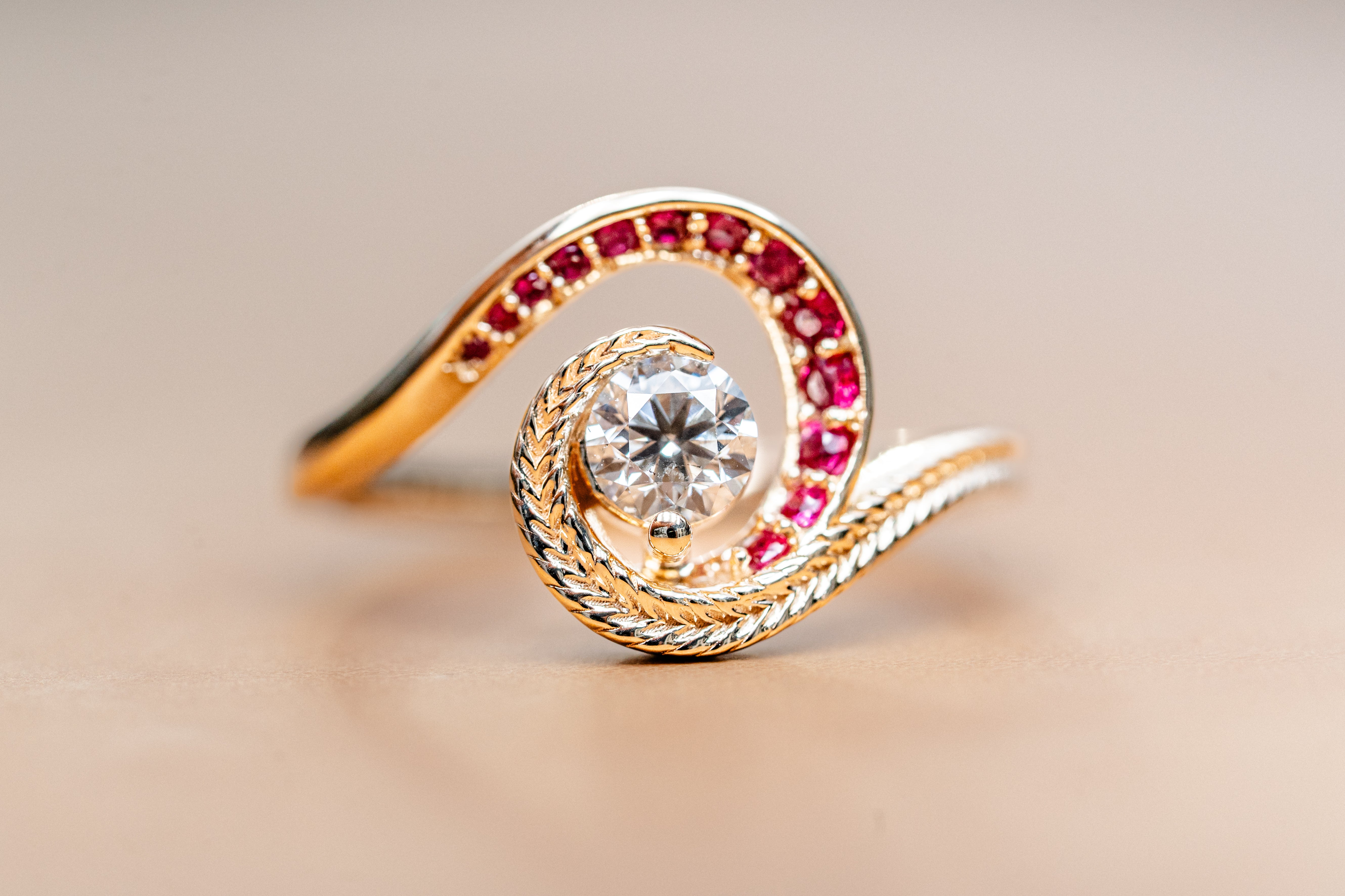 Custom Swirling Diamond Ruby Wave Ring with Maile Vine