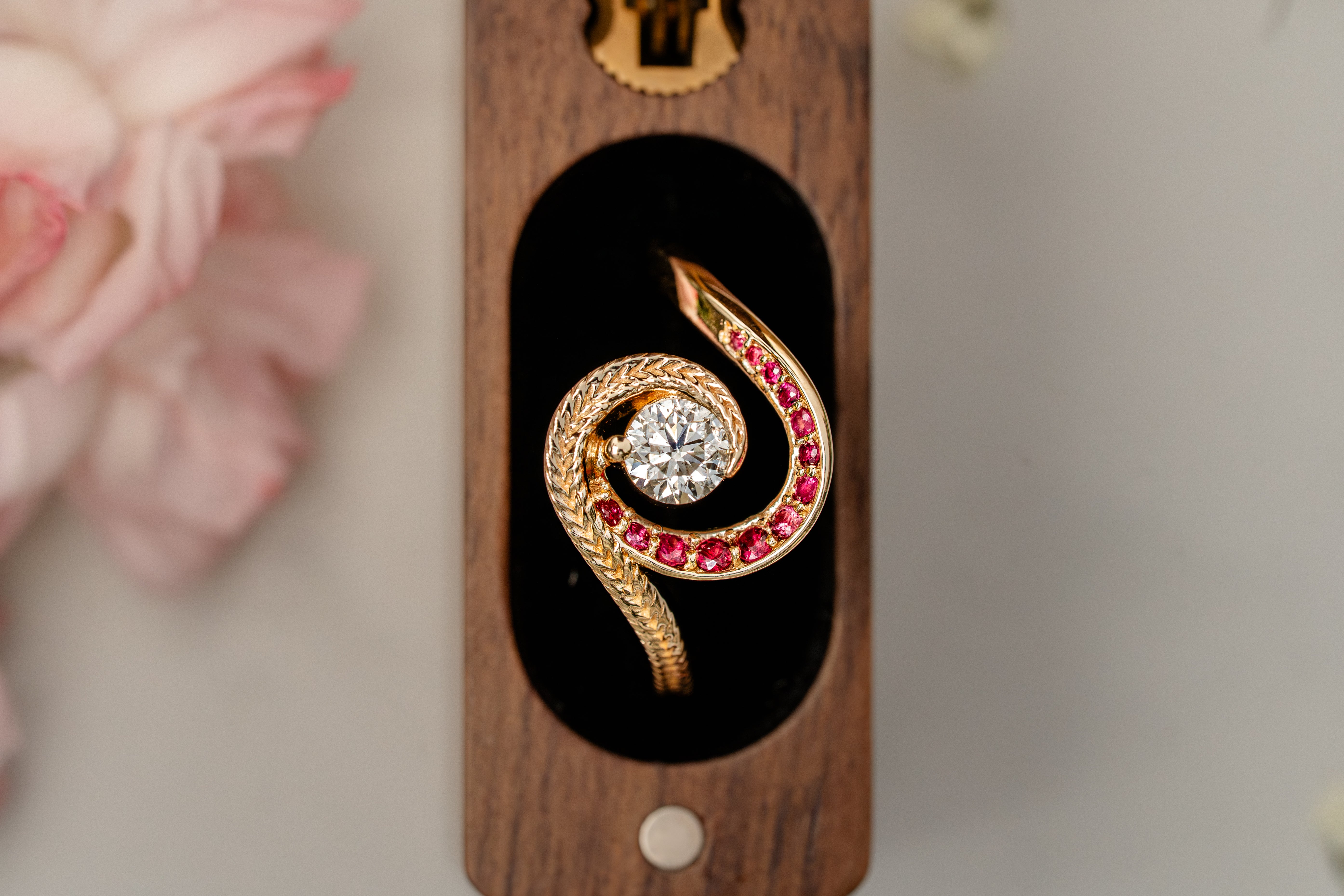 Custom Swirling Diamond Ruby Wave Ring with Maile Vine