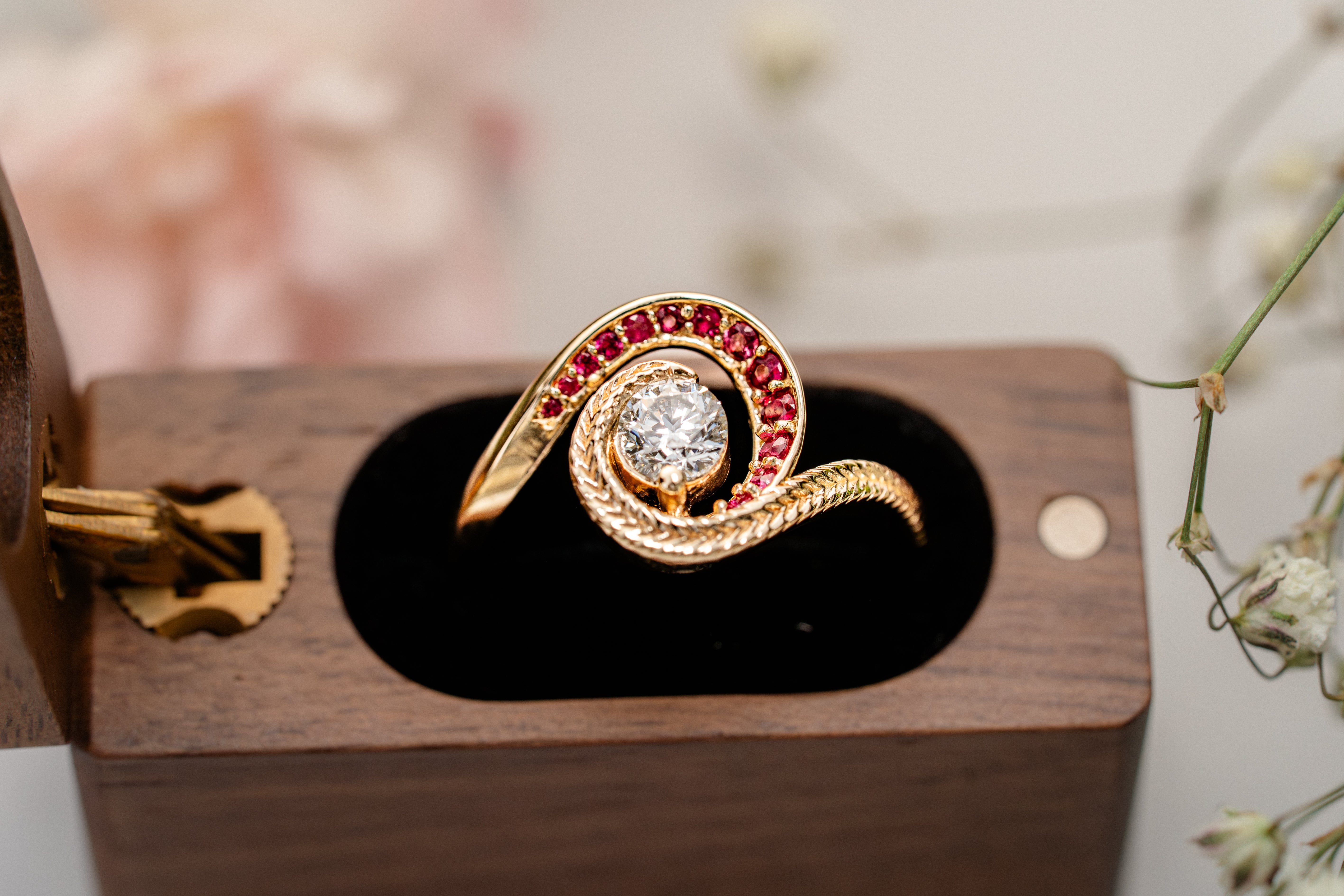 Custom Swirling Diamond Ruby Wave Ring with Maile Vine