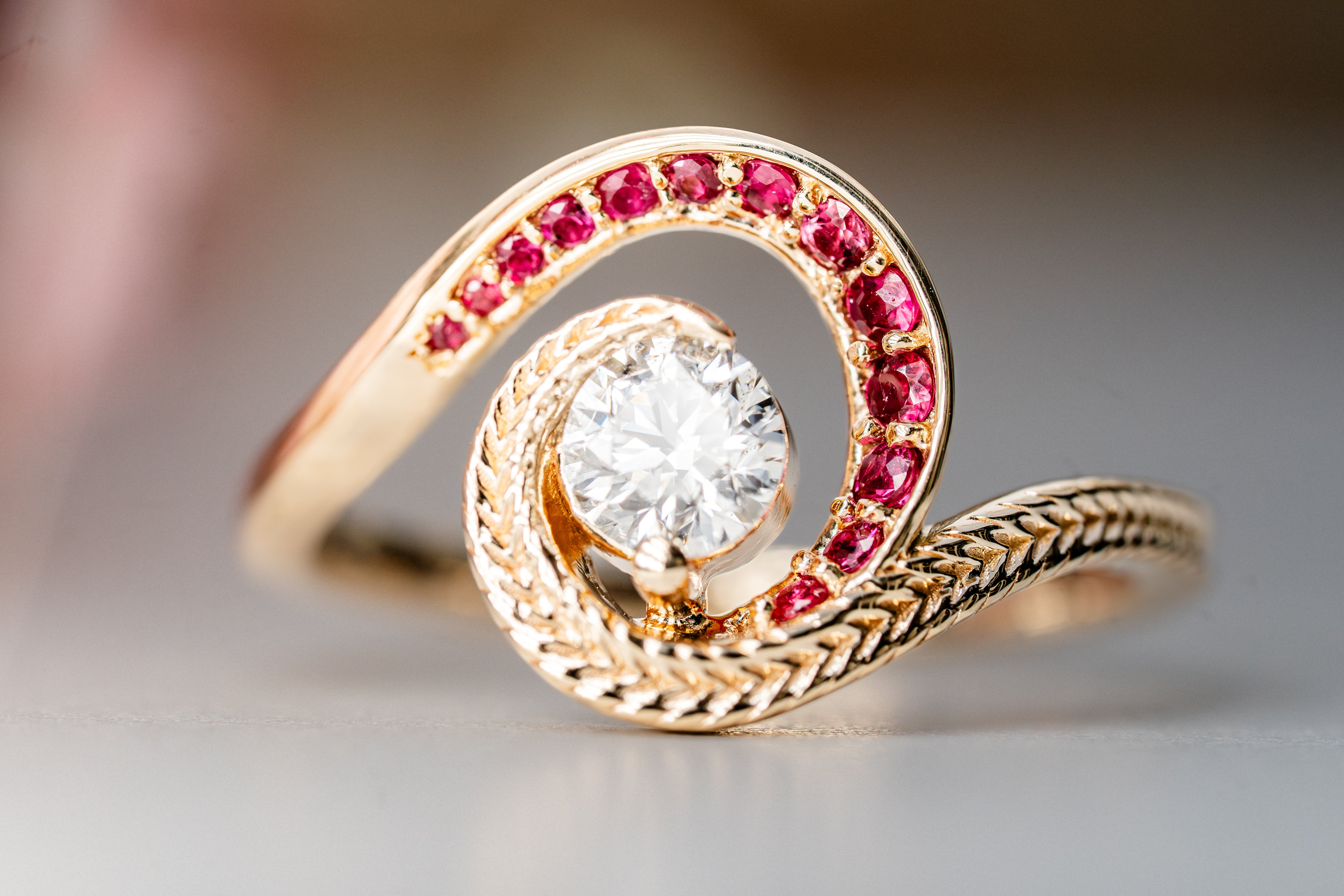 Custom Swirling Diamond Ruby Wave Ring with Maile Vine
